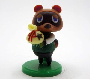 Petite figurine choco Egg - Animal crossing - Tom Nook (Tanukichi)